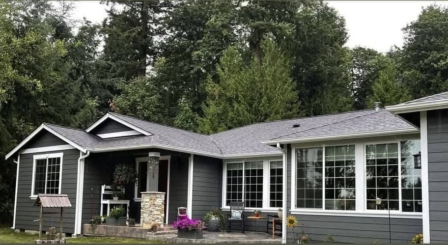 The same ranch after repainting in deep grey